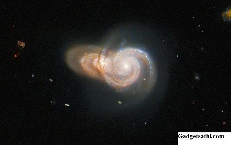 Hubble Space Telescope Spots Overlapping Spiral Galaxies